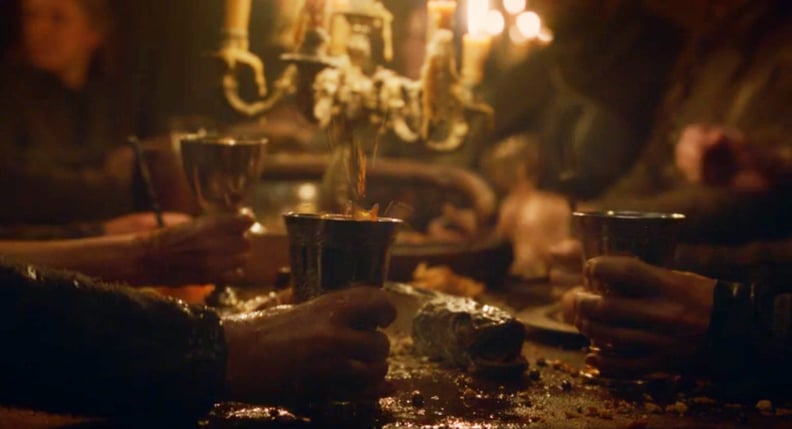 Guests pounding on the table to get everyone's attention at the Red Wedding