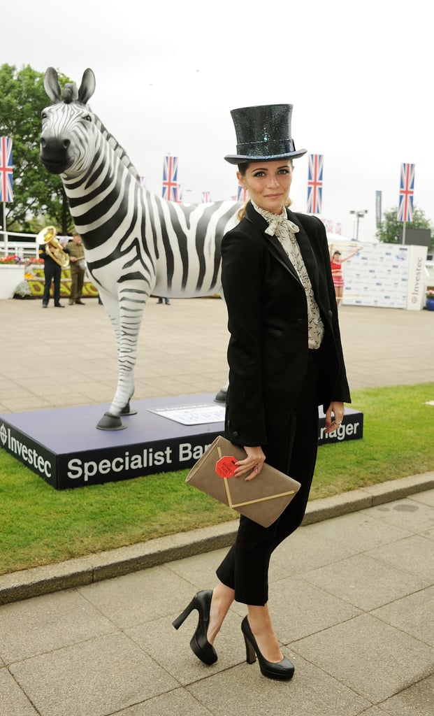 Mischa Barton stood by a zebra installation at the derby.
Mischa Barton stood by a zebra installation at the derby.