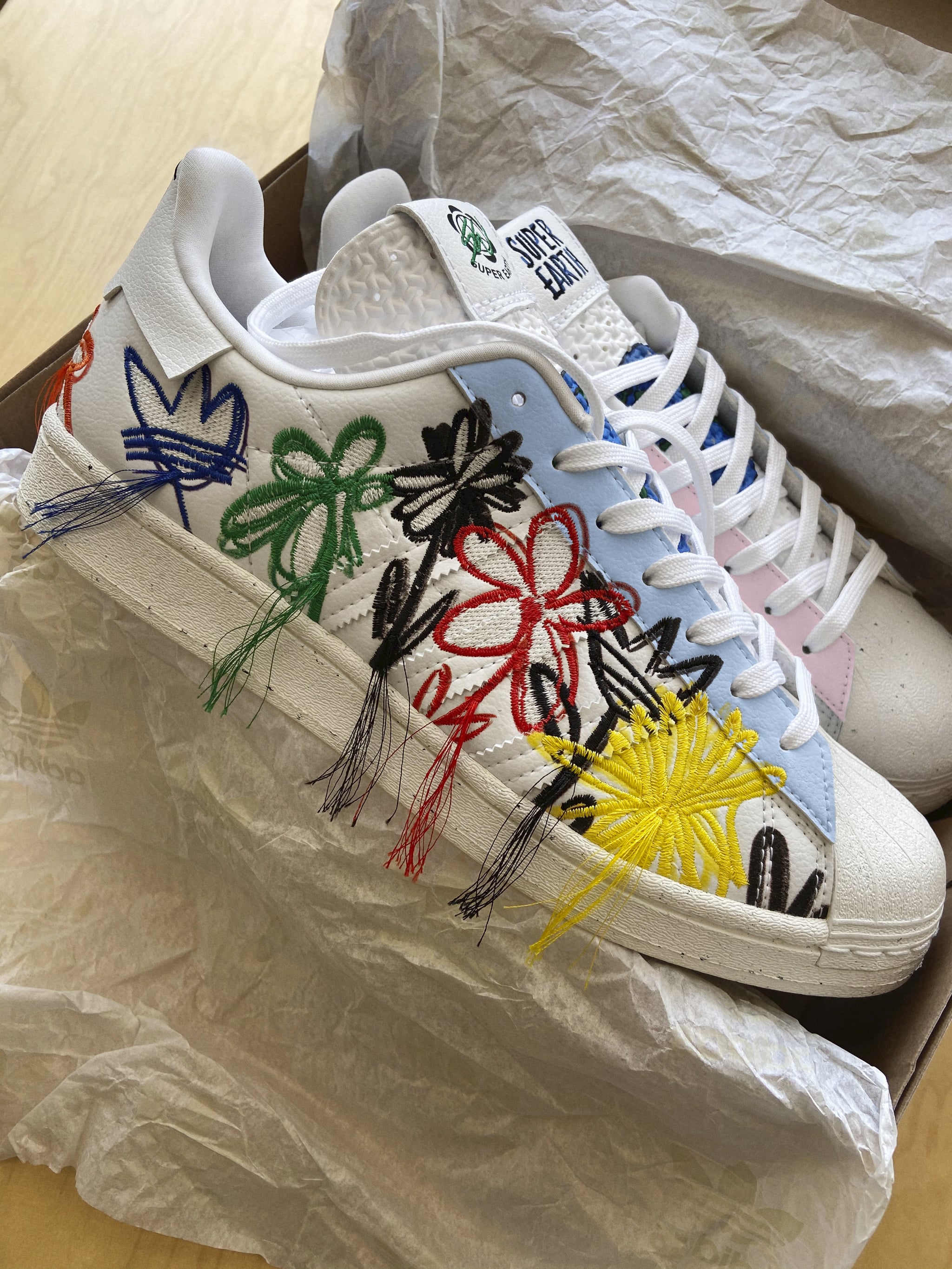 adidas with flowers on them