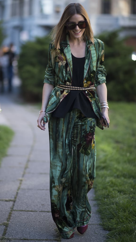 You couldn't miss Olivia in this bold patterned suit while running around Milan. She tempered the print with a black top and added her quintessential flair with an embellished belt.