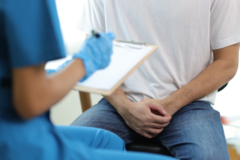 Doctor is diagnosing male erectile dysfunction and giving treatment recommendations, male health problems.