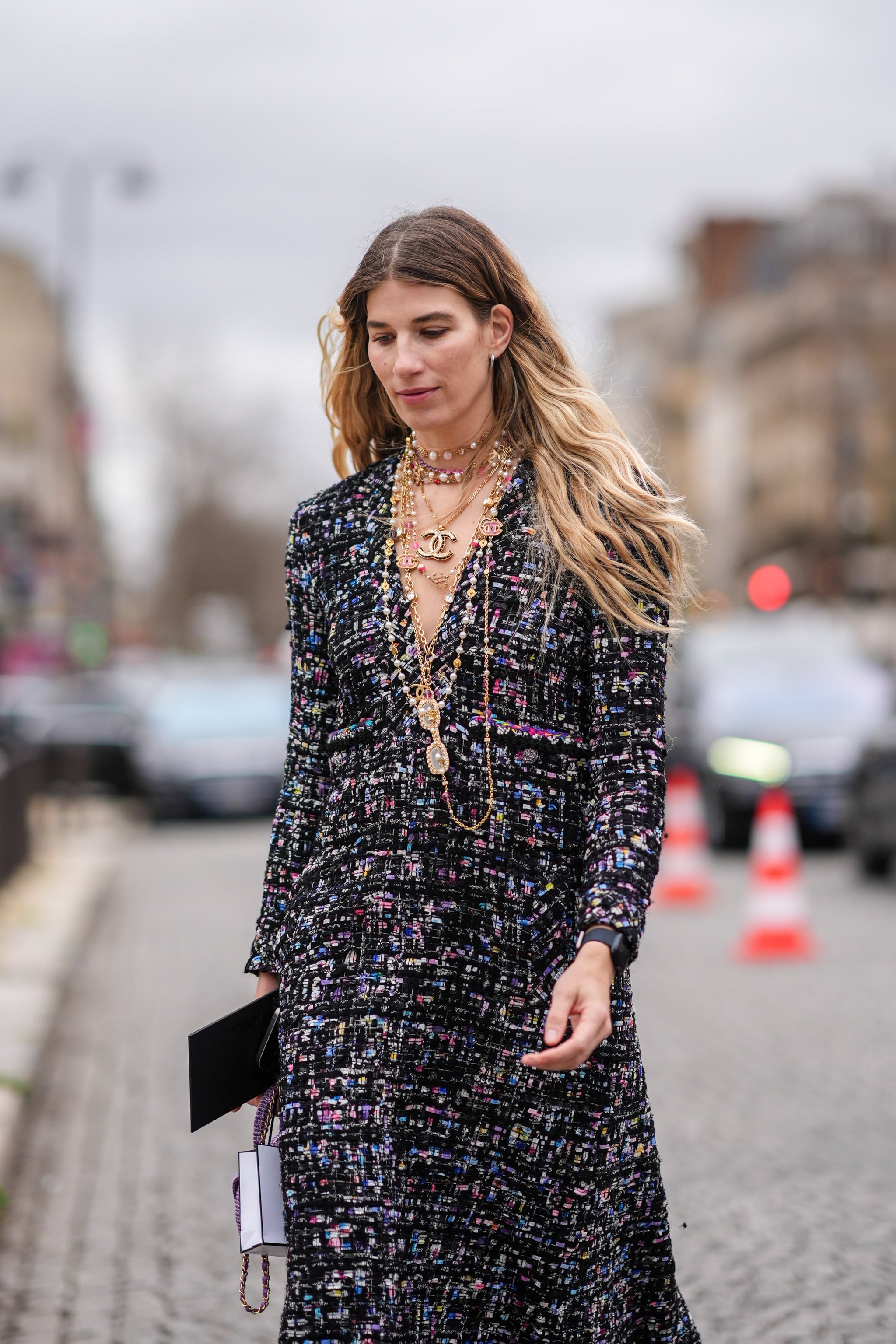 PARIS, FRANCE - MARCH 05: Veronika Heilbrunner wears a tweed colored jacket, Chanel necklaces, tie outside Chanel, during the Womenswear Fall/Winter 2024/2025 as part of  Paris Fashion Week on March 05, 2024 in Paris, France. (Photo by Edward Berthelot/Getty Images)