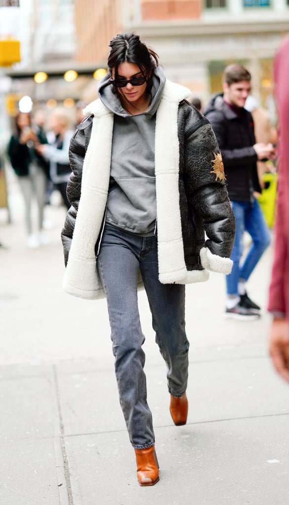 In late January, she kept warm in a Vera Wang oversize jacket, hoodie, Yeezy jeans, and Saint Laurent boots.