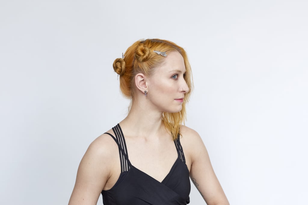 Divide rough-dried hair into four even sections. Twist and secure three pieces with sectioning clips.