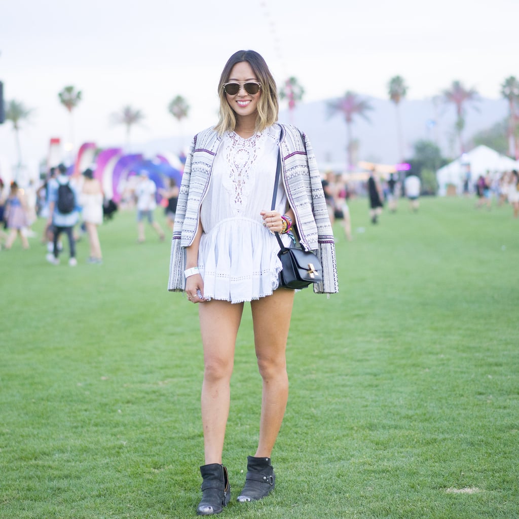 Aimee Song worked a playful printed jacket over her lacy top and chose desert booties to romp around in at the festival.