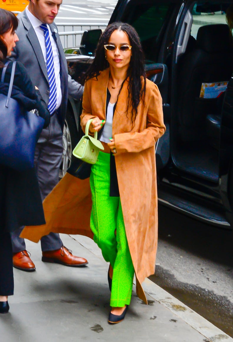 Zoë Kravitz Wearing Lime Pants With a By Far Bag in NYC