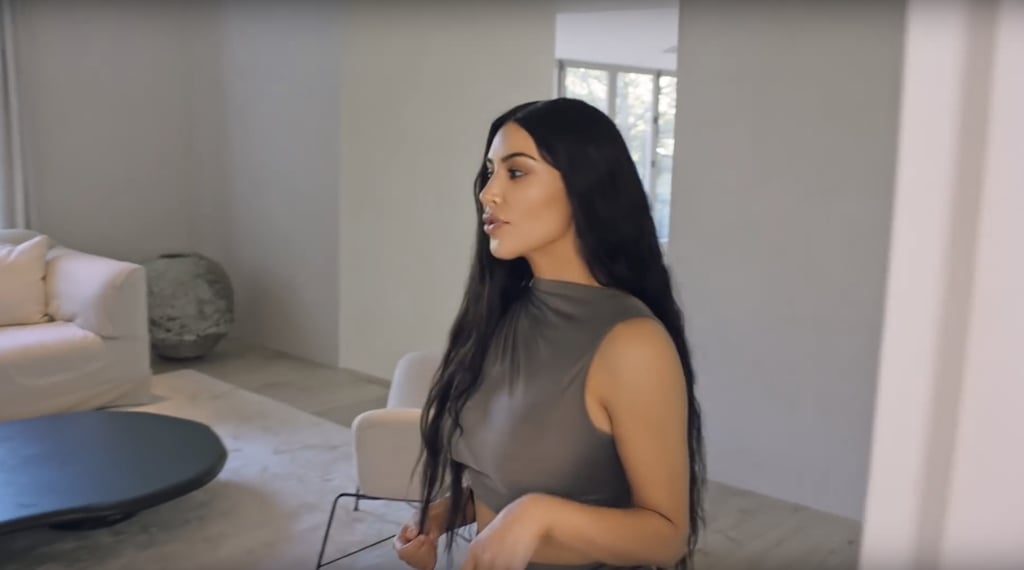 The secluded living room that gives way to Kim and Kanye's bedroom has linen-colored couches, chairs, and a rug to match.