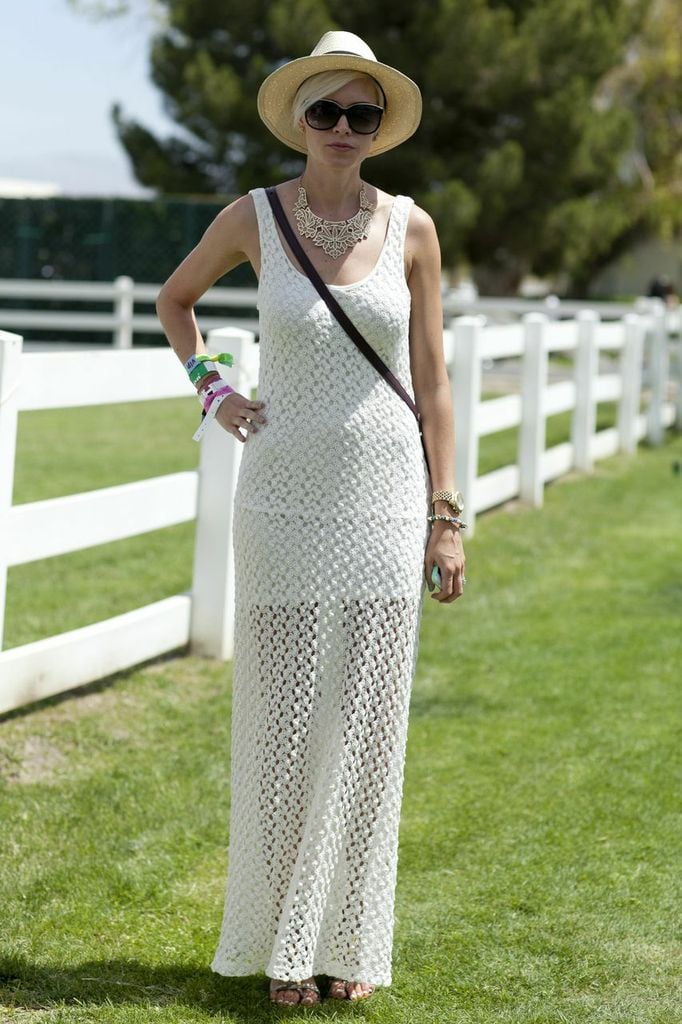 A chic festival party look comprised a bohemian knit maxi dress and chic accessories.