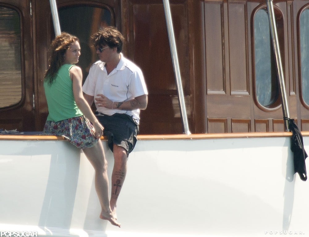 Johnny Depp and Vanessa Paradis hung out on the side of their yacht during an August 2011 trip to France.