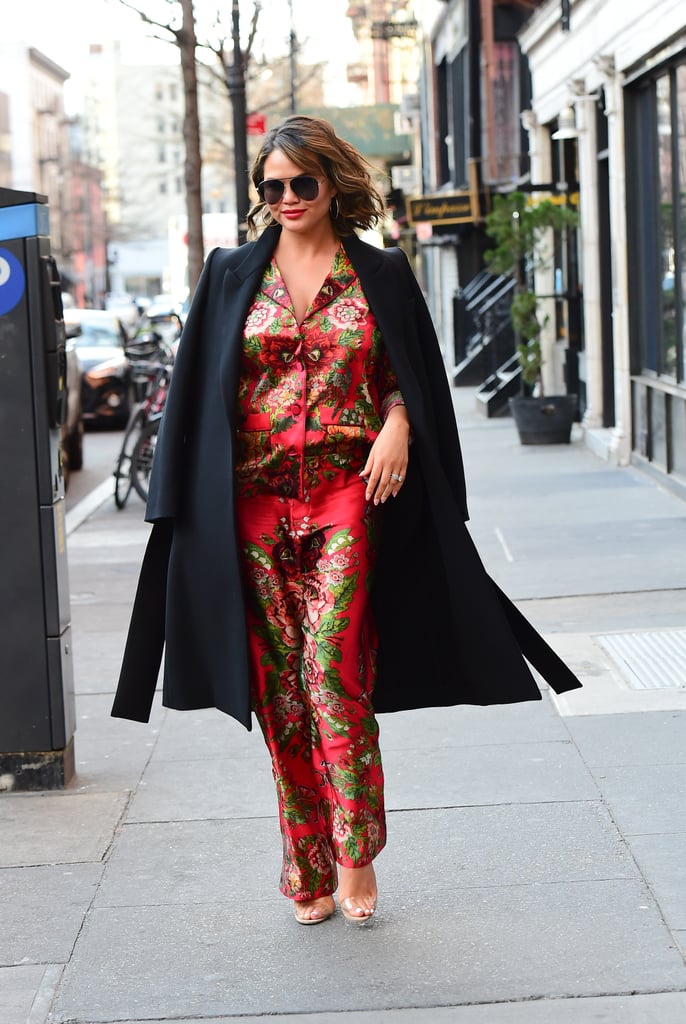 Wearing a bright red floral pajama set while out in NYC.