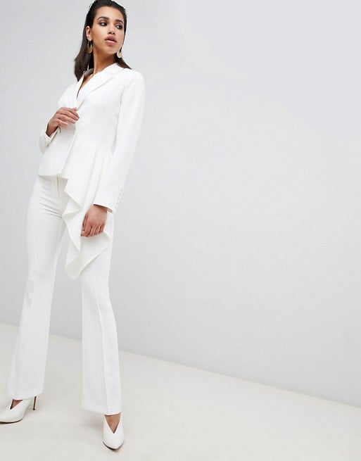 This bright white ASOS Asymmetric Suit ($143) is both eclectic and elegant.