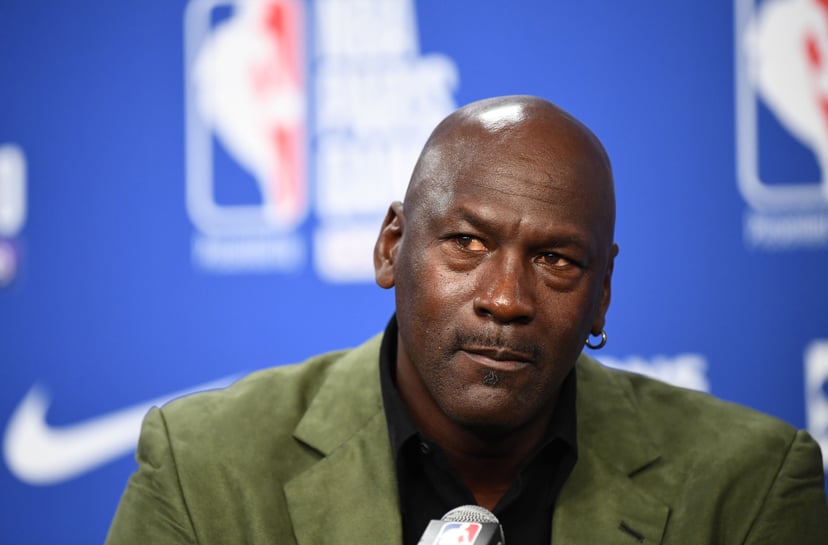 Former NBA star and owner of Charlotte Hornets team Michael Jordan looks on as he addresses a press conference ahead of the NBA basketball match between Milwaukee Bucks and Charlotte Hornets at The AccorHotels Arena in Paris on January 24, 2020. (Photo by
