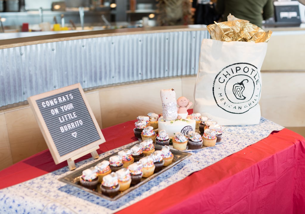 The dessert table featuring a gift bag resembling Chipotle's delicious chips.