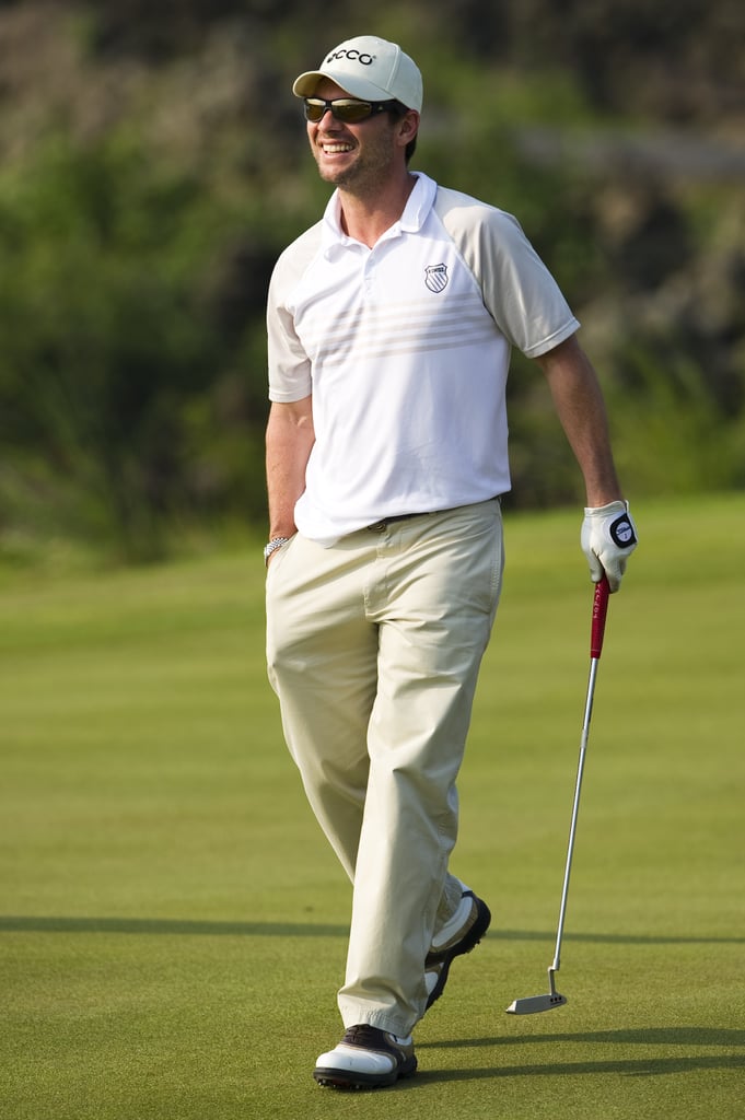 Christian Slater smiled big during an October 2010 tournament in China.