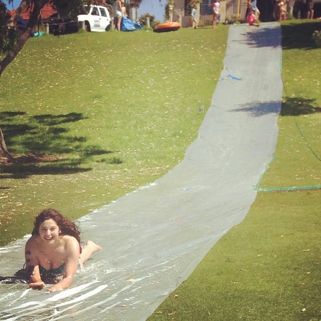 And smiling their way down giant Slip 'N Slides.