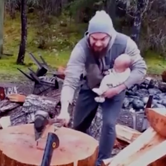 Dad Chopping Wood With His Newborn