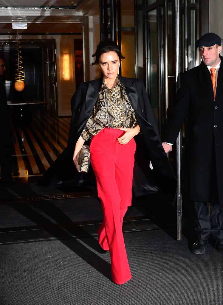 Victoria Beckham Red Pants and Snakeskin Blouse January 2019