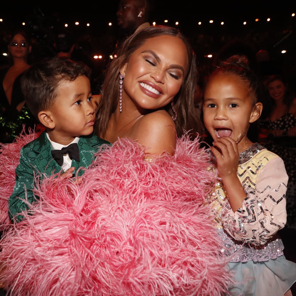 Chrissy Teigen Takes Miles and Luna to Play in a Dinosaur Park: 
