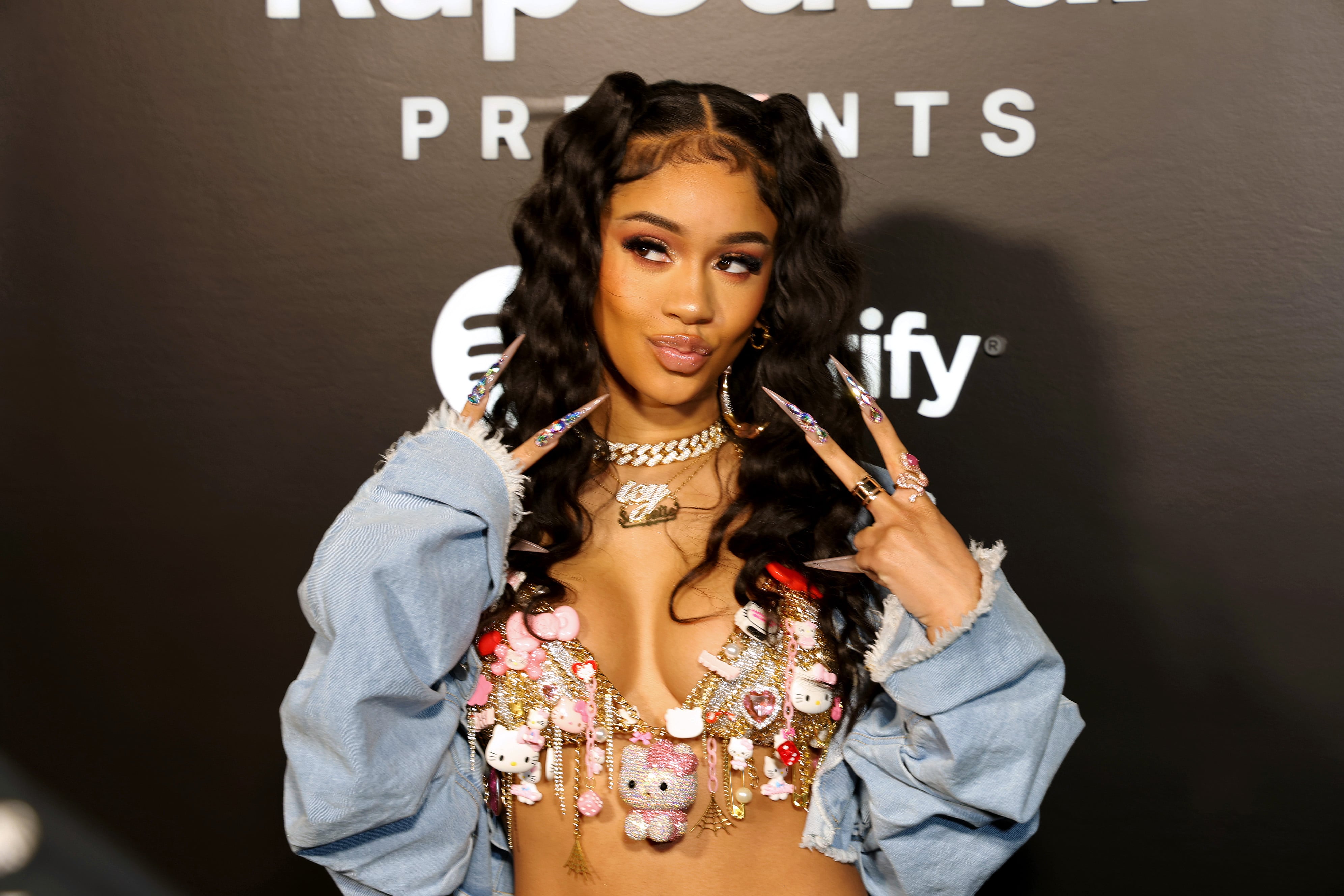 Fashion, Shopping & Style  Saweetie's Delicate Bra Top Is Held