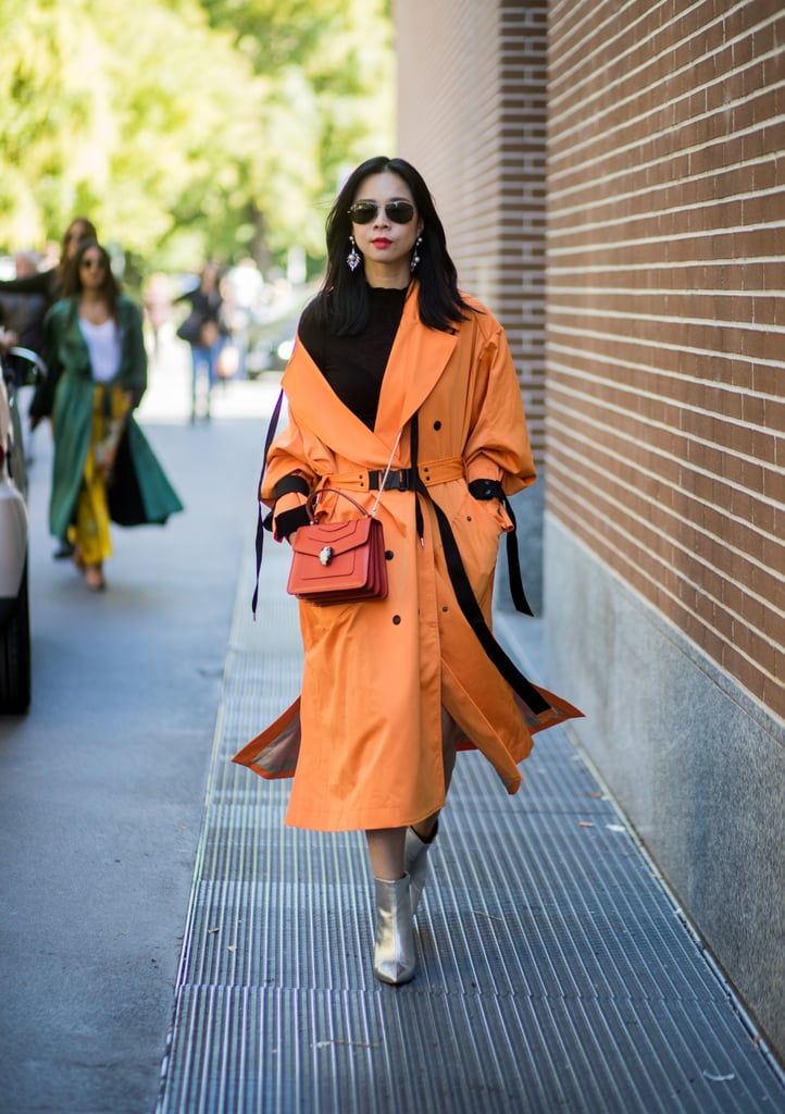 This street style star got a head start on the trend with an orange coat and matching Bulgari bag. The two different shades complemented each other and proved orange has staying power beyond Halloween.
