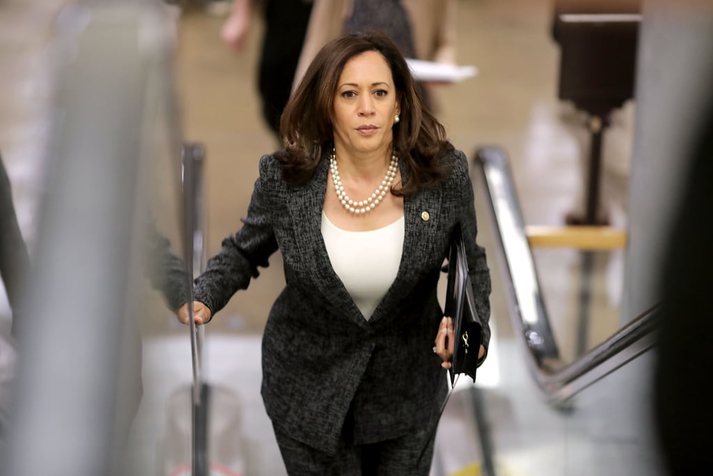 Kamala Harris meant business as Senator at the U.S. Capitol in May 2017, coordinating her pearls with a sleek, fitted tank top underneath her cross-stitch salt-and-pepper pantsuit.