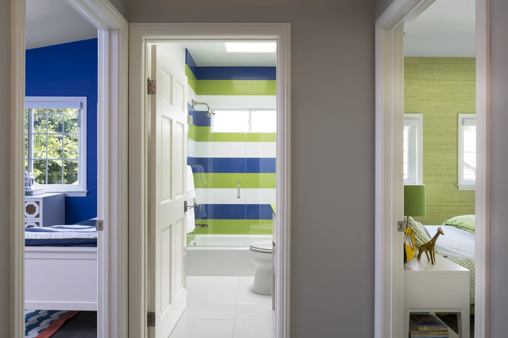 A uniform and playful sense of color unites the boys' bedrooms and bathroom upstairs.