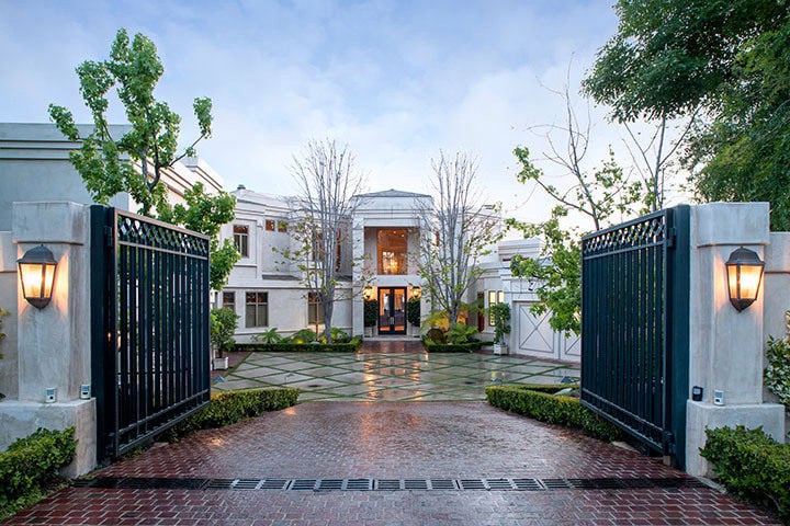 The sprawling estate is gated at the end of a cul-de-sac.