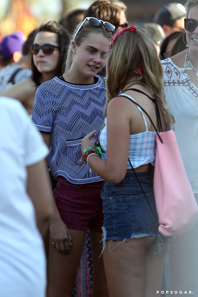 Cara Delevingne wore a patterned top to the festival.