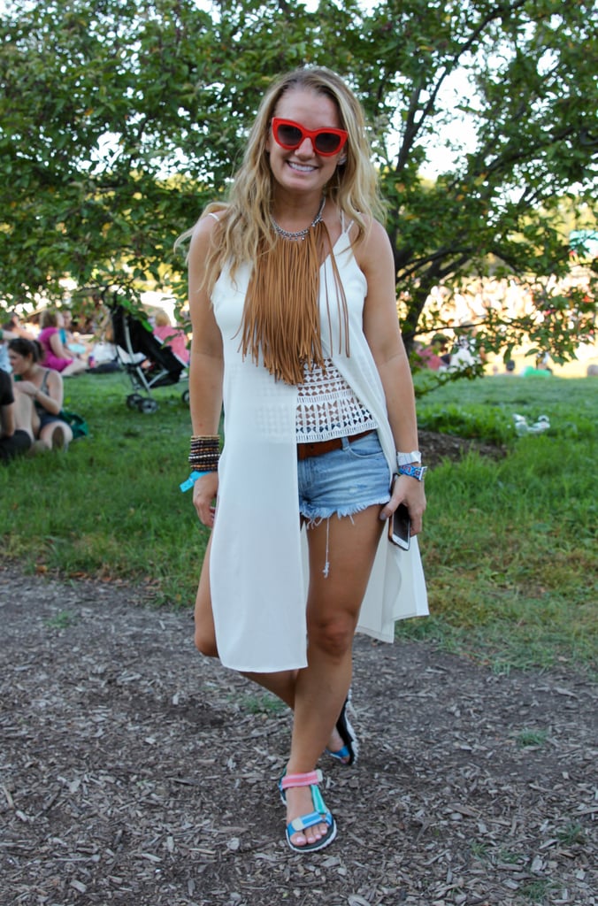 This attendee bought her complete look — from her bold, fringe necklace and her red-framed shades to her stack of bracelets and her multicolored sporty sandals — from Zara.