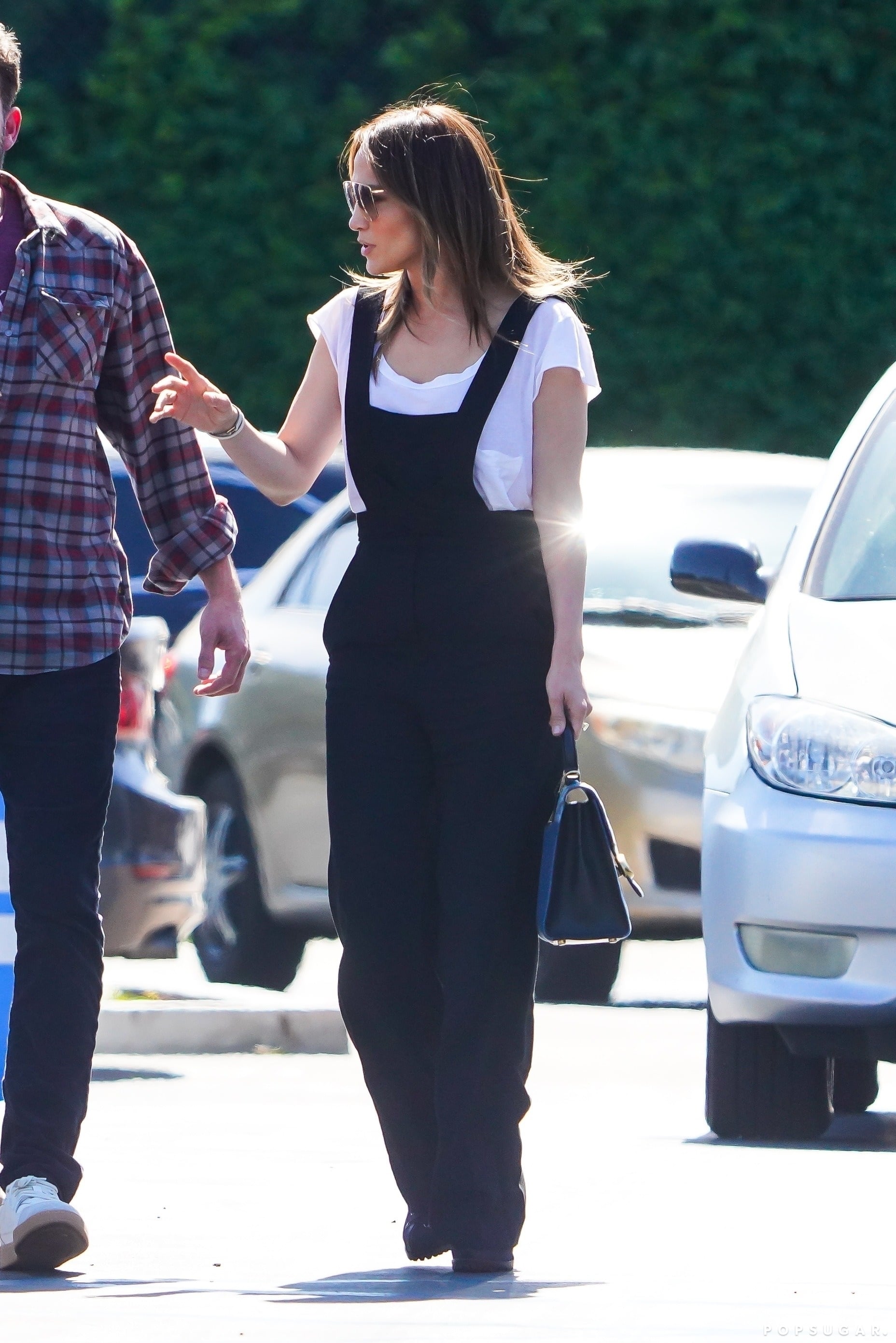 Jennifer lopez black jumpsuit deals