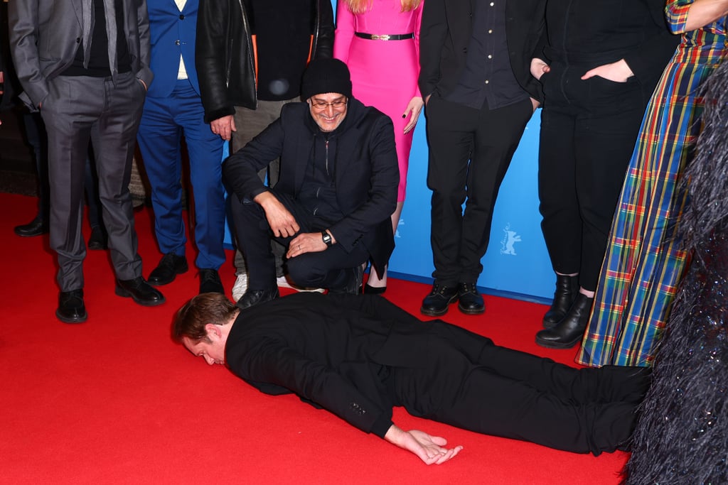 Alexander Skarsgård Lies Down on the Floor to the Red Carpet