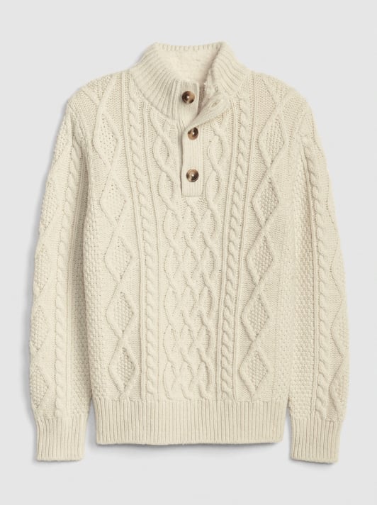 Not only is this boys' cable-knit sweater ($45) extra cute, but it's extra cozy, too! A mockneck provides essential warmth, and the classic pattern is ideal for holiday parties and family events.