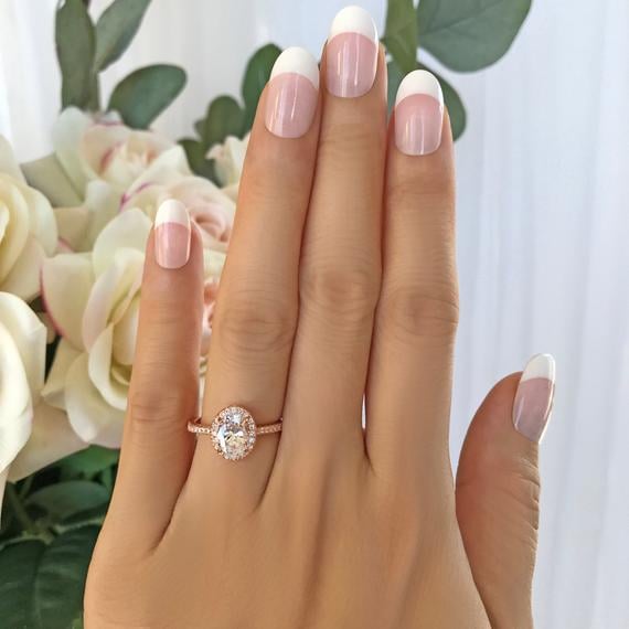 1.5 ctw Classic Oval Halo Man-Made Diamond Simulant Engagement Ring