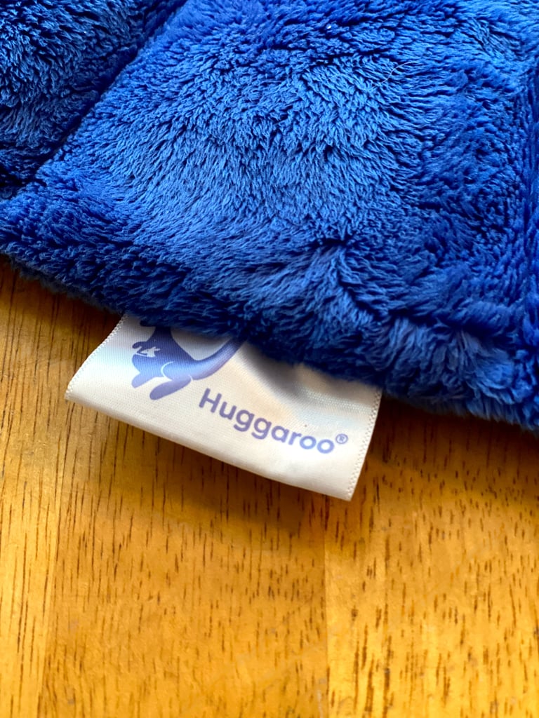 What Is the Huggaroo Weighted Neck and Shoulder Heating Pad Made of?