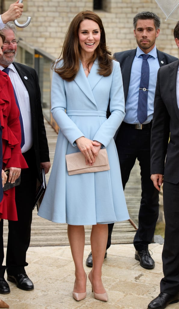 Kate visited the Dräi Eechelen Museum in Luxembourg on May 2017 and wore a pastel blue coat by Emilia Wickstead and LK Bennett beige pumps. She carried a matching nude clutch by Etui.