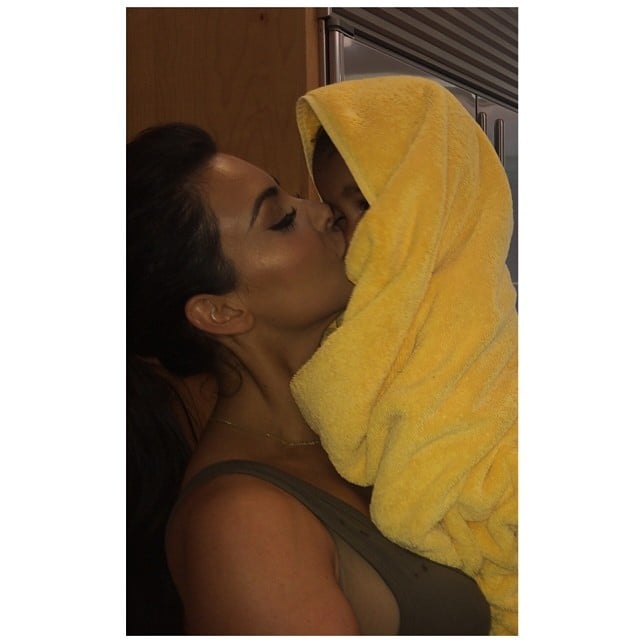 Kim Kardashian gave little North a kiss after she completed her first swim lesson and took her first steps.
Source: Instagram user kimkardashian