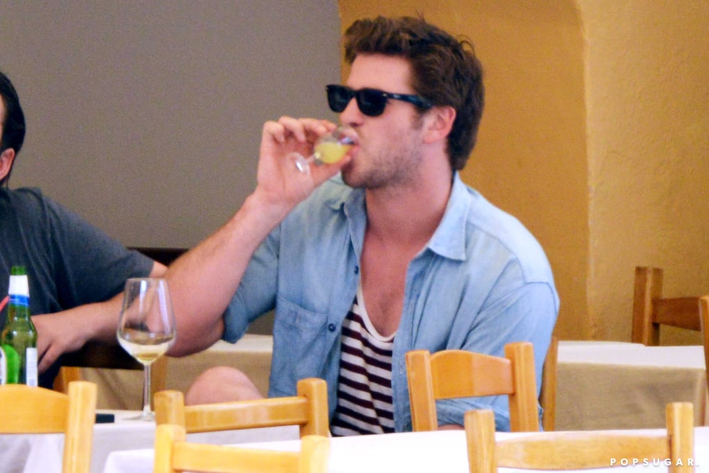 Liam Hemsworth sipped from a tiny glass on Friday in Portofino, Italy.