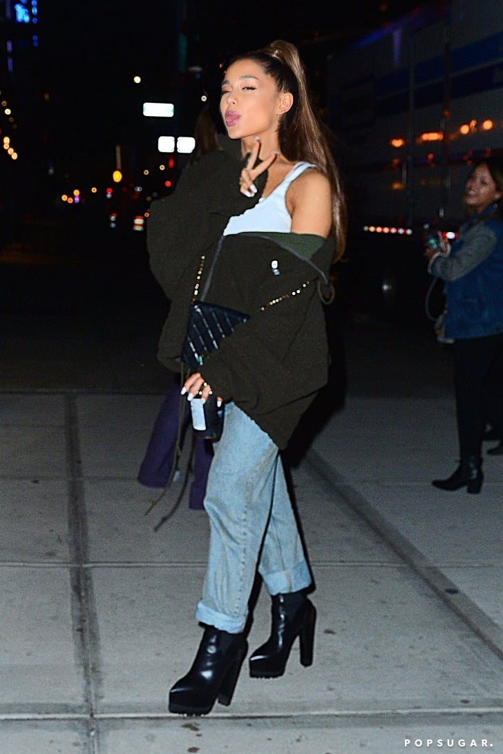 Ariana Grande wears a Louis Vuitton puffer jacket as she steps out