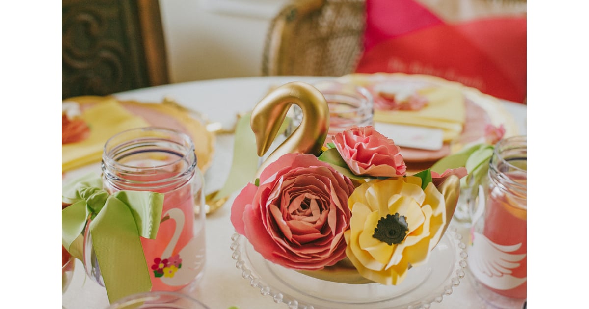 The swan centerpieces were filled with paper flowers. SwanThemed