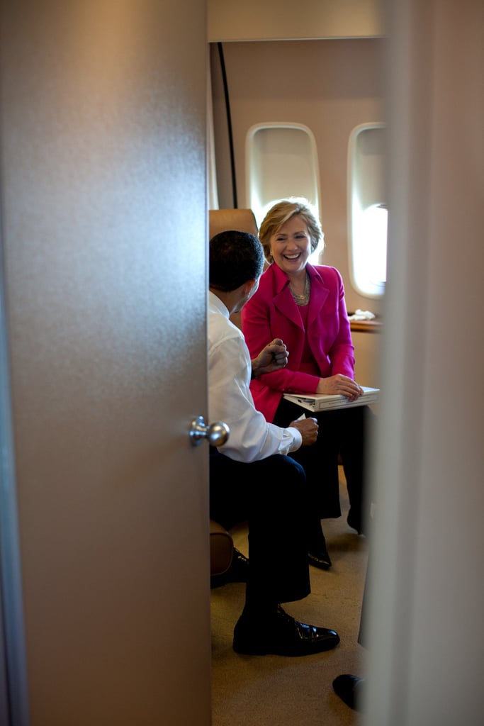 Using Air Force One for taking meetings and having a laugh with Secretary of State Clinton.