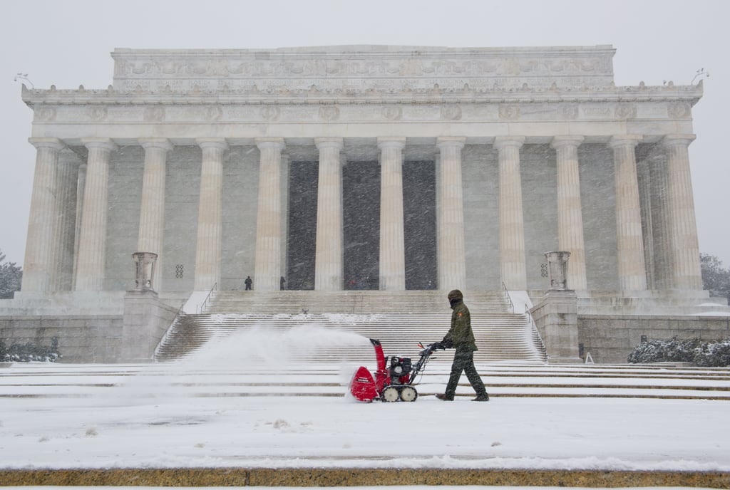 The walkways outside the Lincoln Memorial were cleared of snow by a US Park Service employee.
