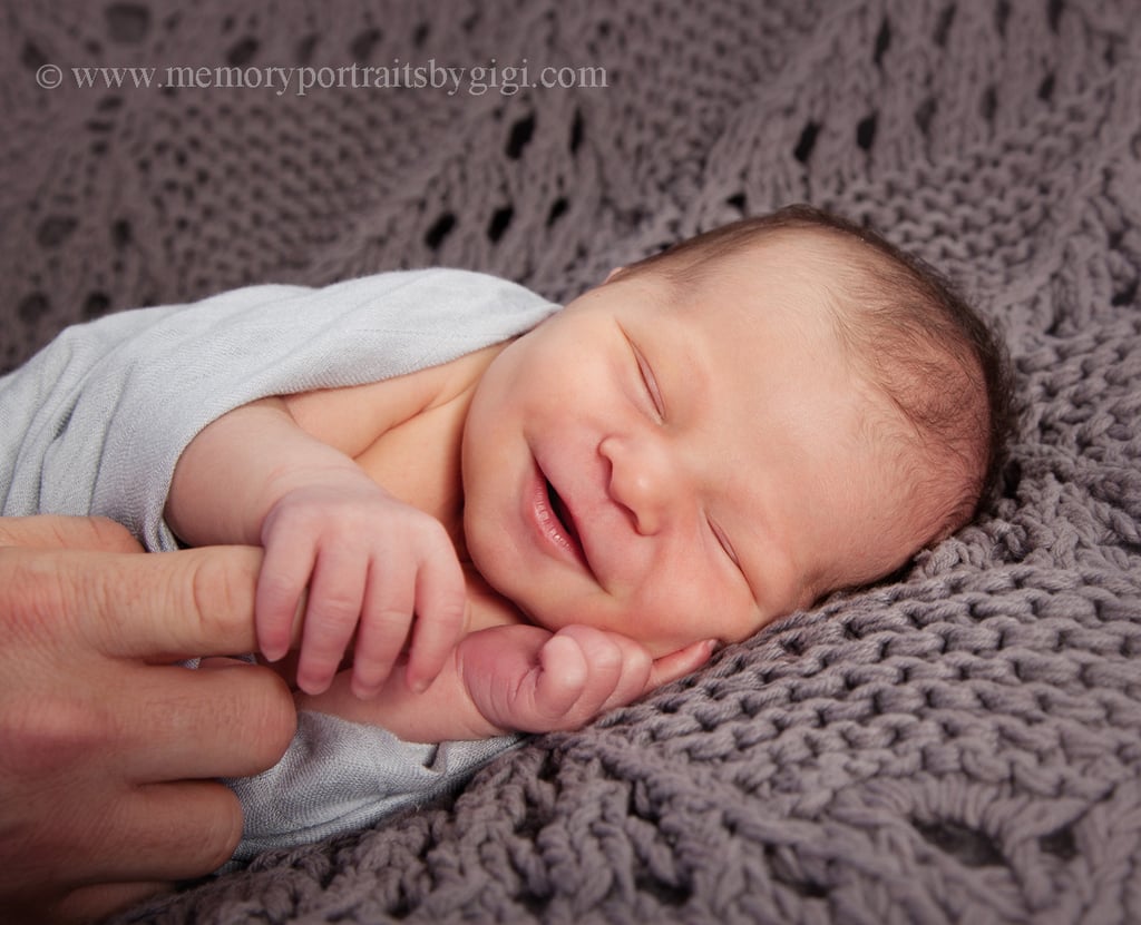 Baby Poops on Dad During Newborn Photo Shoot