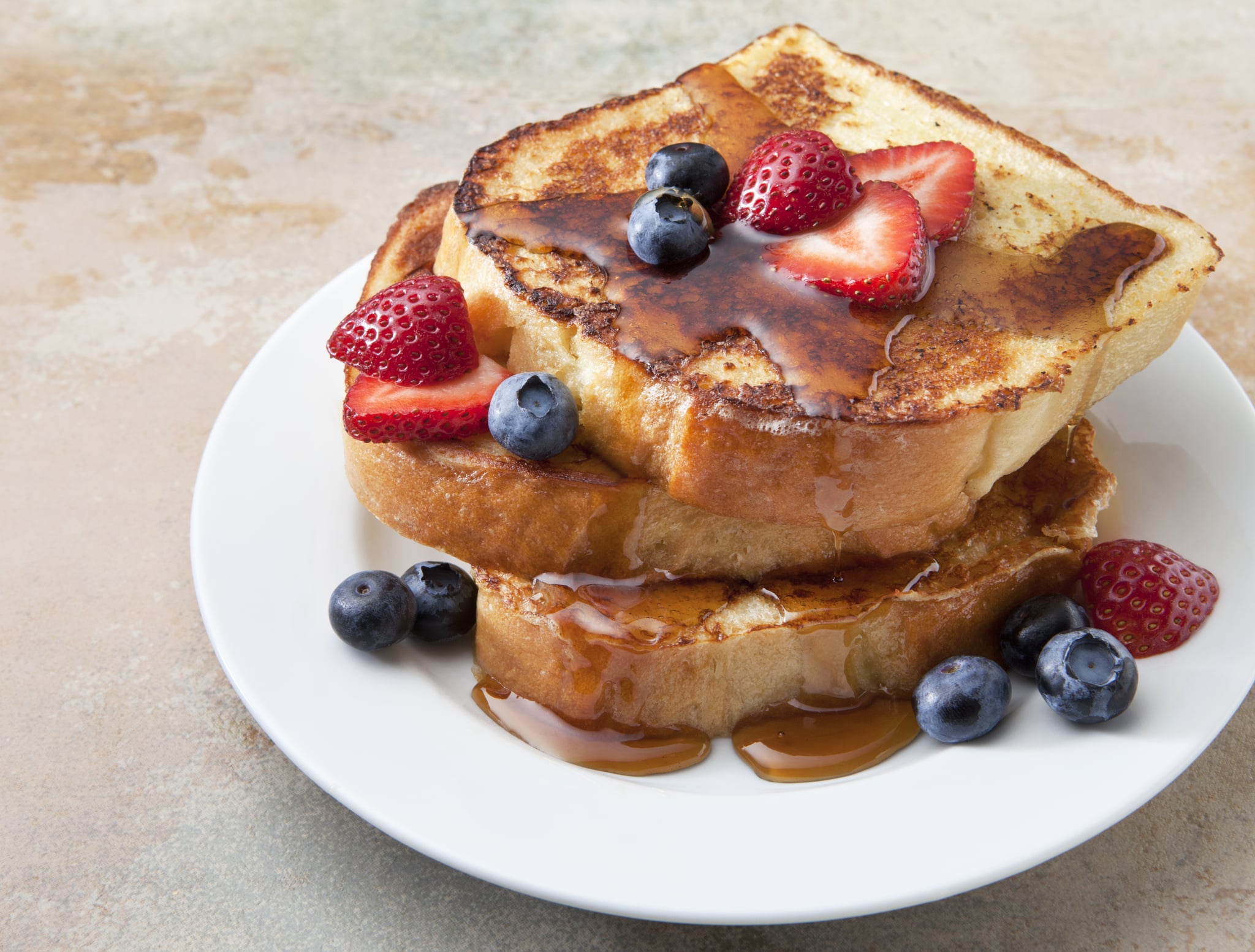 French toast with strawberries and blueberries.