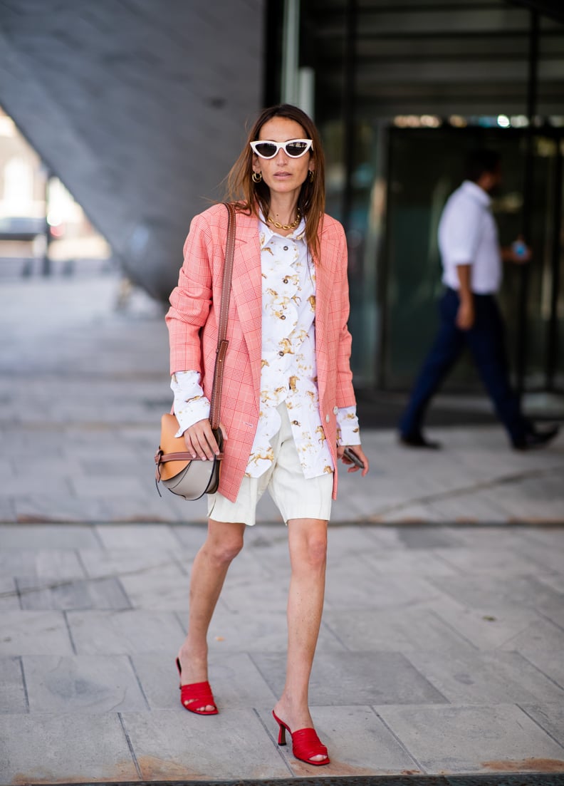 Style White Shorts With a Printed Top and Red Heels