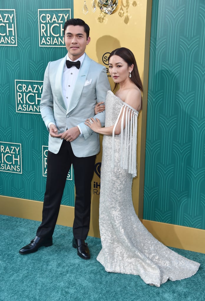 Pictured: Henry Golding and Constance Wu