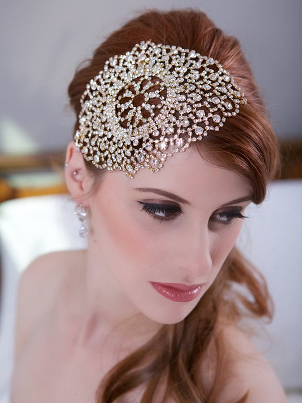 For engaged ladies who don't want to wear veils, this lacy crystal headpiece ($78) is a gorgeous alternative. It is available in rose gold or yellow gold, and it features sparkly crystals with an intricate embroidery pattern.