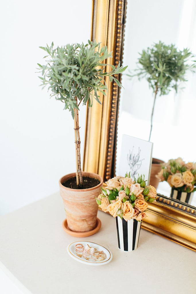 Blooms and growing plants lend a distinctly feminine vibe to the bedroom. Blooms and growing plants lend a distinctly feminine vibe to the bedroom.