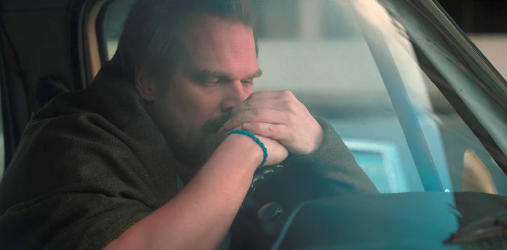 In season two, it's a bit harder to spot the bracelet, but it's definitely still there. You can spot it in this scene about halfway through the season, when Hopper's trying to get in touch with Eleven via radio.