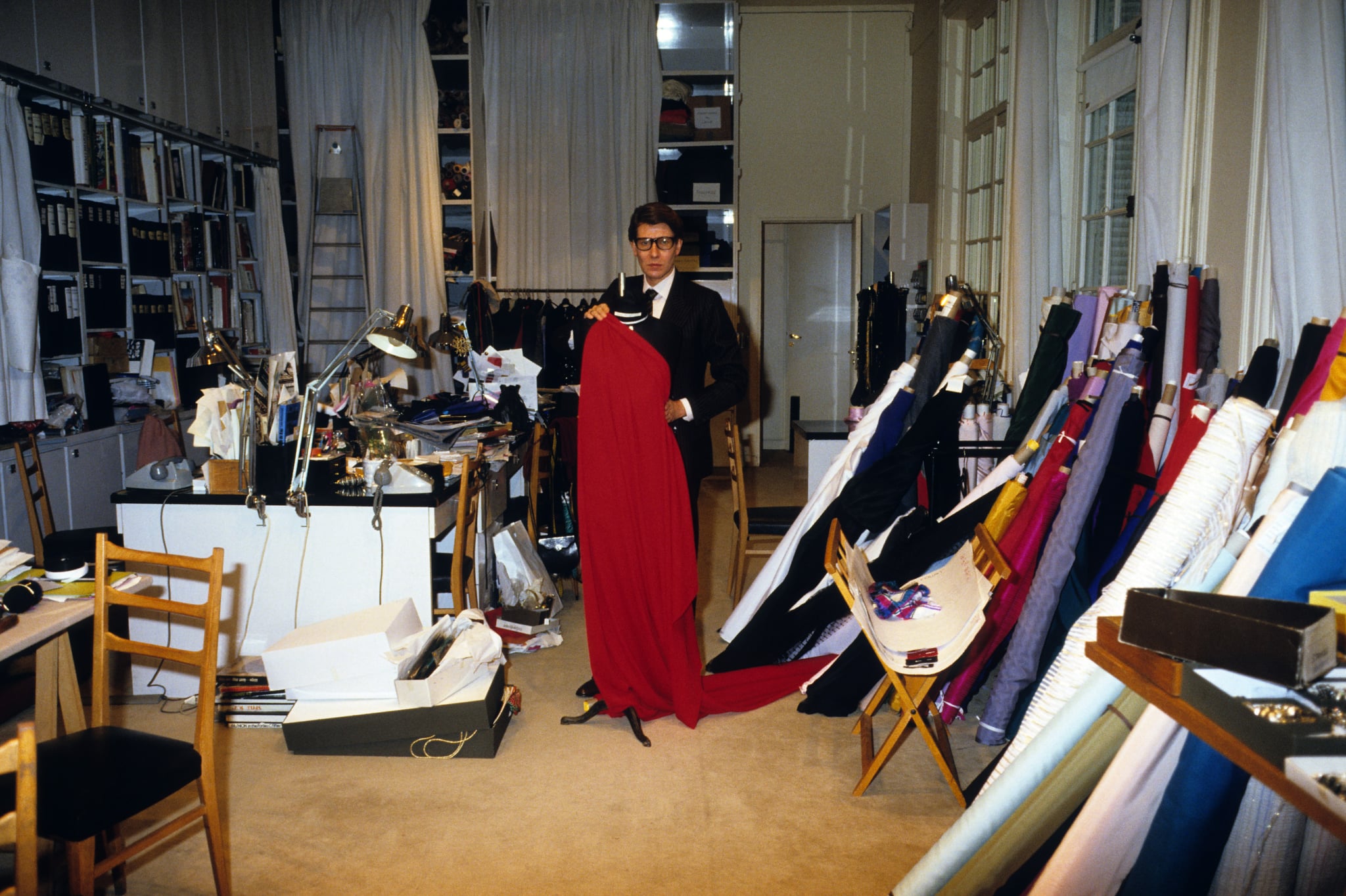 Yves Saint Laurent showed off his wares at his atelier in 1982. 