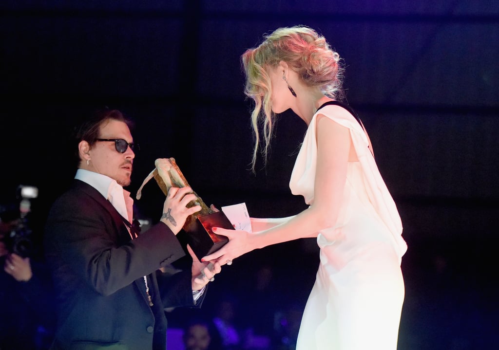 Johnny Depp and Amber Heard at the Art of Elysium Gala 2015